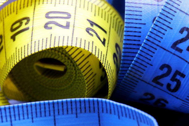 特写彩色卷尺的背景图片下载