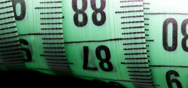 特写彩色卷尺的背景图片下载