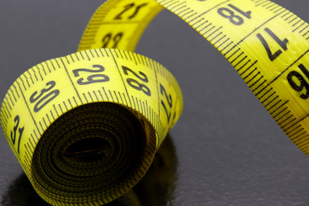 特写彩色卷尺的背景图片下载