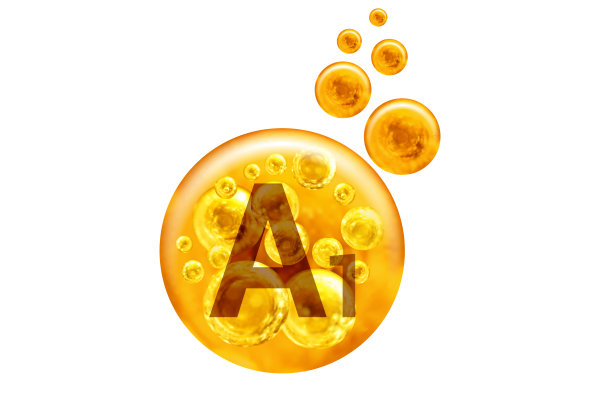 维生素A1胶囊。白色背景上带有孤立气泡的金色小球。健康的生活方式的概念。图片下载