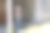 工程师年轻女子戴着白色头盔站在户外，手持文件夹文件现场工作。女建筑师戴着施工安全帽或安全帽在工地检查正在进行的工作。图片下载