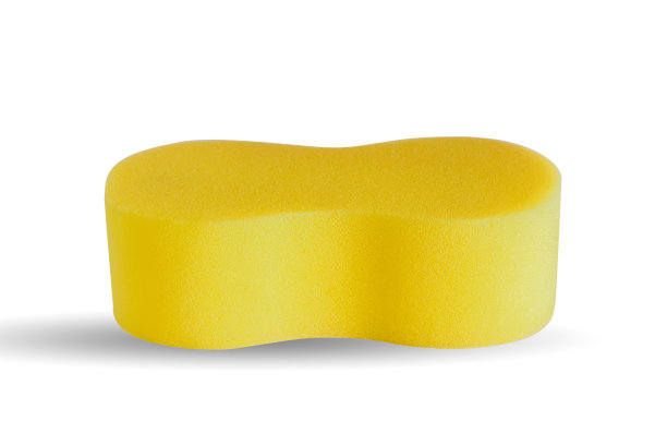 白色背景上的黄色软海绵。图片下载