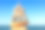 石禅金字塔的彩色卵石以大海为背景。生活平衡的概念图片下载