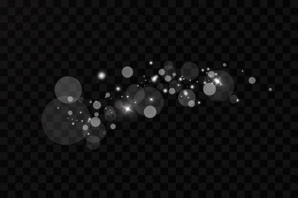 光的效果。抽象的圣诞尘埃。闪闪发光，神奇的灰尘颗粒。雪花。雪正在下降。图片下载