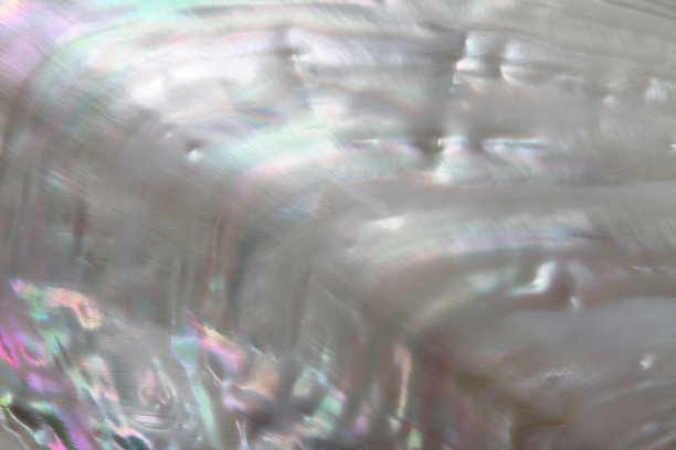 白色自然卷曲珍珠质的背景图片下载