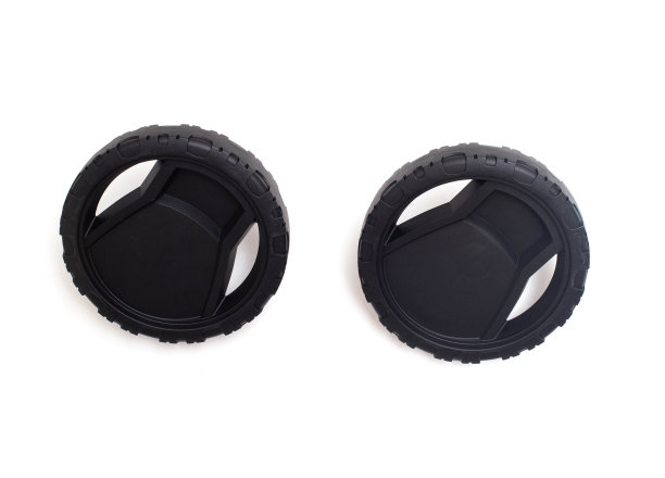 黑色塑料车轮从一个压力垫圈在一个白色的背景，孤立。特写镜头图片下载