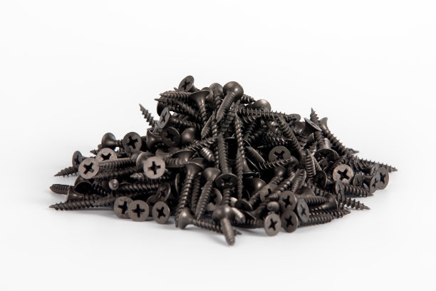 白色背景上的黑色螺丝。螺丝为石膏板图片下载