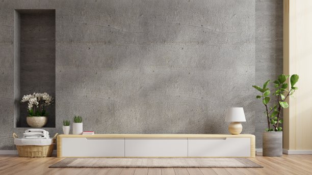 混凝土墙背景装饰的现代客厅柜式电视。图片下载