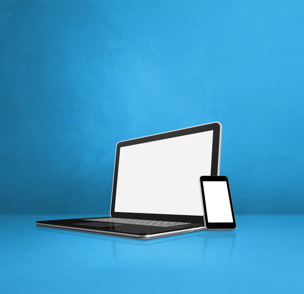 蓝色办公桌上放着笔记本电脑和手机图片下载