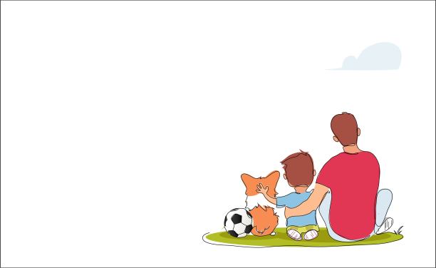 父亲拥抱坐在草坪上的儿子。素材图片