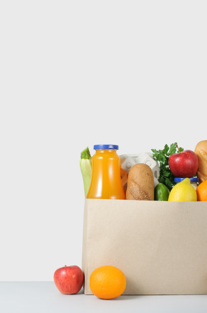 桌上放着食物的盒子，还有复印空间，捐款。送货上门。网上购物的概念图片下载