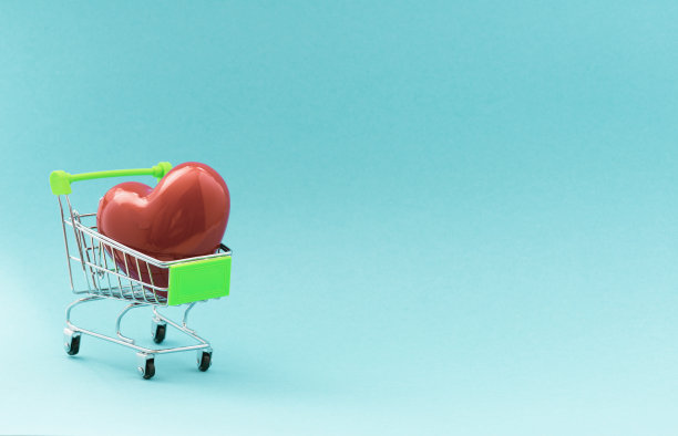 绿色购物车销售在商店的概念图片下载