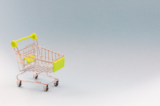 绿色购物车销售在商店的概念图片下载