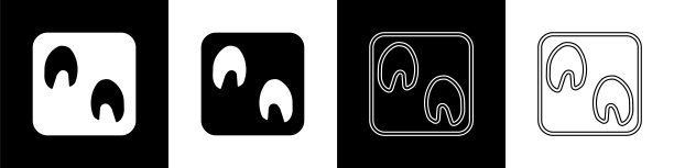 设置马爪脚印图标隔离在黑色和白色的背景。向量图片下载