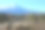 日本富士山旅游著名地标。蓝蓝的山，彩色的天空，乡村的背景图片下载
