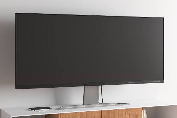 电视宽屏电视架在现代客厅与白墙。图片下载