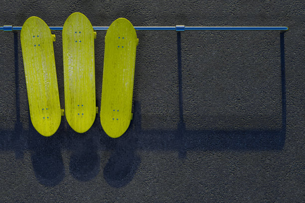 3d渲染顶视图三个黄色滑板在沥青地面在滑板公园。图片下载