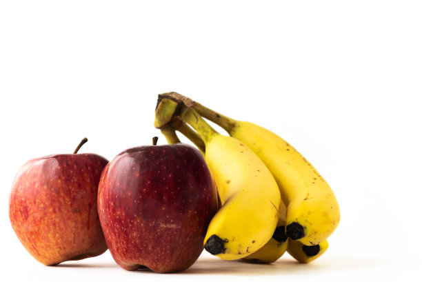 白色背景下的香蕉和苹果图片下载