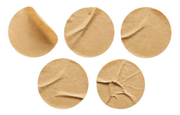 棕色圆纸不干胶标签孤立在白色背景上图片下载