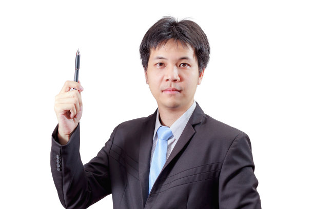 英俊的商人用钢笔在空气中书写孤立图片下载