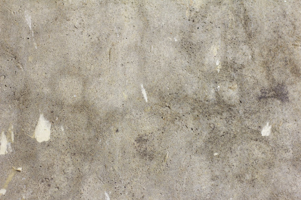 混凝土墙。抽象的纹理混凝土灰色背景。墙纸的裂缝和残余物。修理公寓或办公室。图片下载