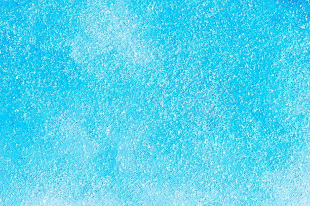 抽象的蓝色背景和白色的碎屑。图片下载