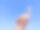 印度南部男性手戴一次性塑料手套，做出第一手势。云背景图片下载
