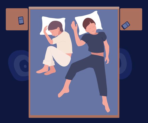 年轻夫妇以放松的姿势睡在家里的床上。黑暗的深夜。女孩和男朋友晚上穿着睡衣睡觉。室内部分与床，床头柜，垫子。前视图。平面向量插图。图片下载