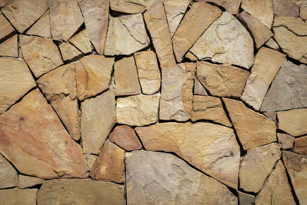 图案装饰的天然石材墙面纹理背景。图片下载