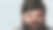 肖像。灰色背景上一个满腹牢骚的大胡子男人。图片下载