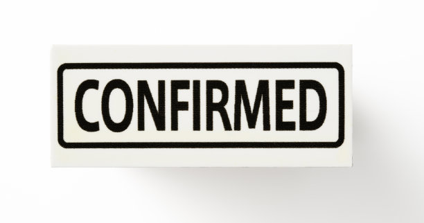 白色背景上的“确认”橡皮图章的孤立镜头图片下载