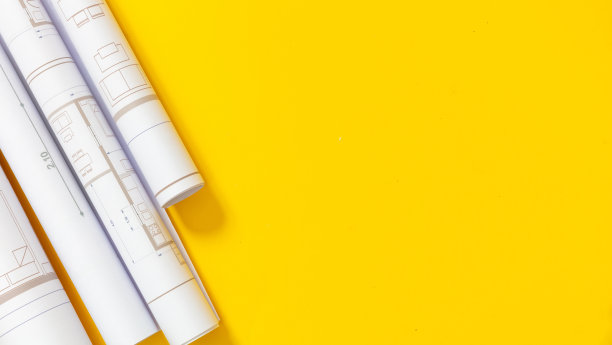 建筑工程图纸概念。建筑蓝图以黄色为背景，复制空间图片下载