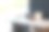 办公场所，桌上有笔记本电脑、咖啡、书籍和其他设备。图片下载
