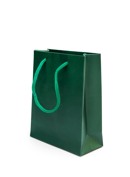 绿色纸袋作为礼物。孤立在白色的。图片下载
