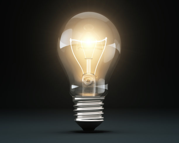 灯泡在黑色渐变背景库存照片图片下载