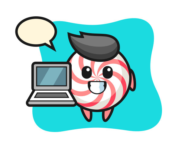 吉祥物糖果和一台笔记本电脑图片下载