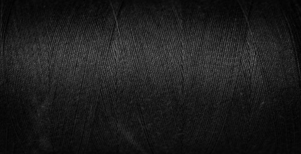 黑色的棉线和可见的细节。背景图片下载