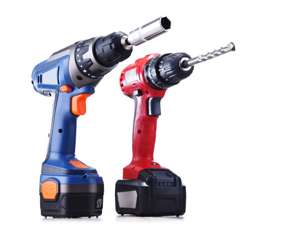 一个螺旋枪和一个手枪手柄的无绳钻隔离在白色图片下载