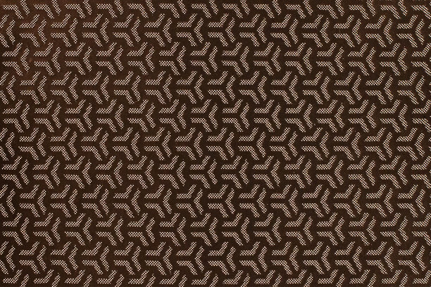 棕色织物与几何图案设计。图片下载