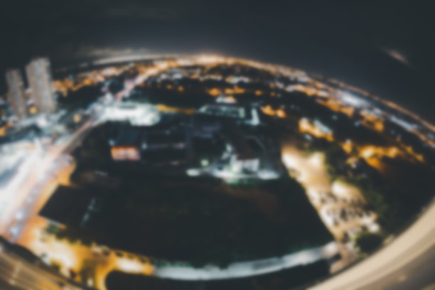 大城市夜晚的散景灯光，抽象模糊散焦背景。鱼眼镜头图片下载