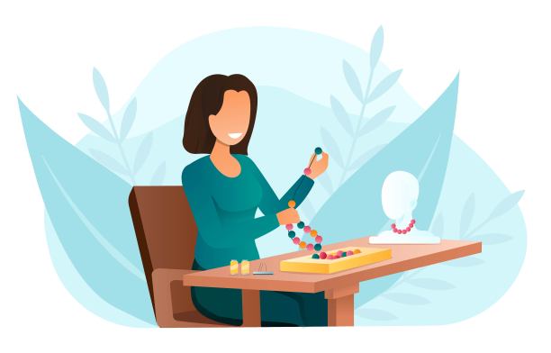 女工制作彩色手工项链图片下载