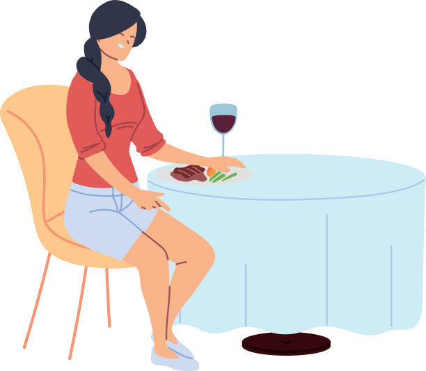 年轻女子坐在餐馆里吃晚餐图片下载