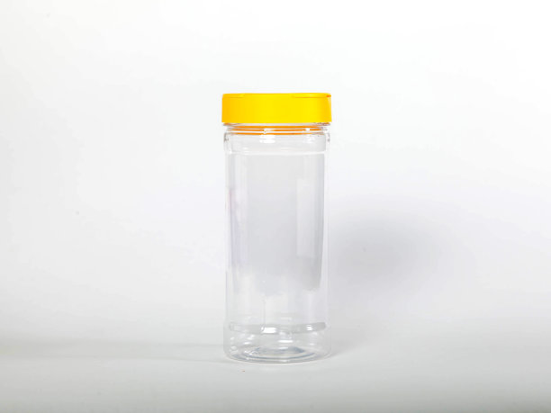 用于储存散装产品的罐，在白色隔离背景上有黄色盖图片下载