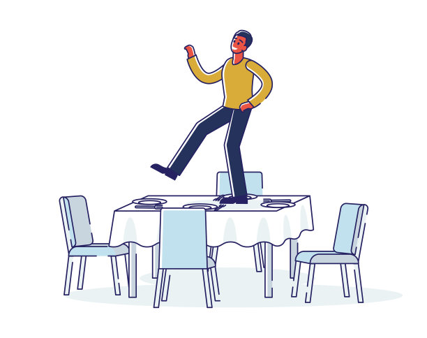 男人在桌子上跳舞庆祝成就或图片下载