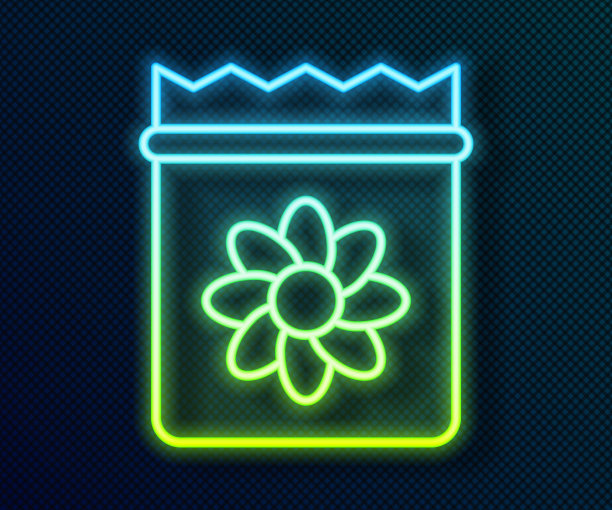 在黑色背景上，装满了特定植物的种子图标。向量图片下载