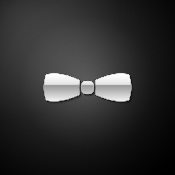 银色蝴蝶结图标孤立在黑色背景图片下载