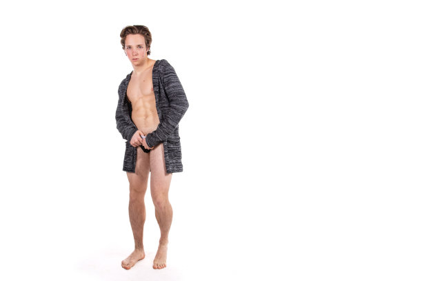 健康的生活方式。帅哥的饮食和运动。白人背景上的年轻英俊男子。图片下载