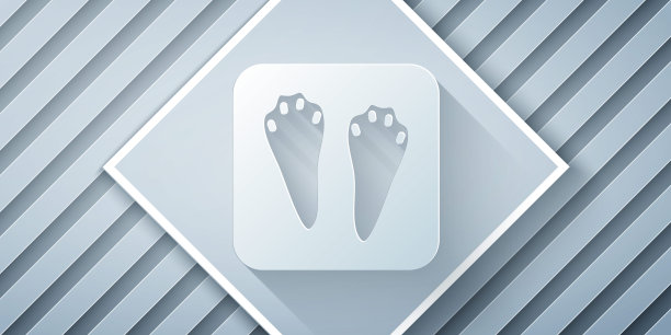 剪纸兔子和兔爪脚印图标孤立在灰色背景。纸艺术风格。向量图片下载