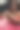 美女肖像，一个年轻女子的脸在浴池里，水里漂浮着红玫瑰花瓣和玫瑰花蕾。图片下载