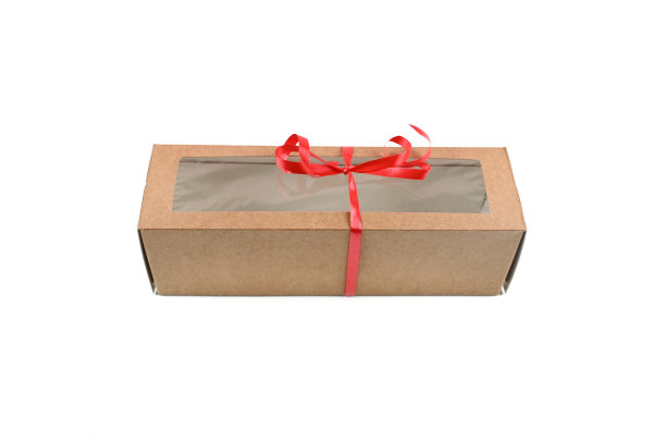 工艺包装与一个红色的弓，在一个孤立的背景图片下载